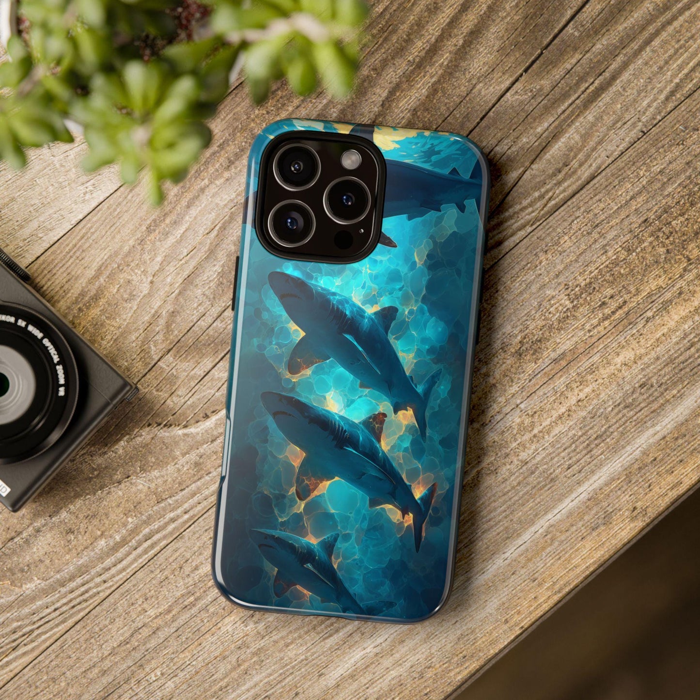 two different phone cases, one glossy and one matte, with a picture of a cloudy sky on them.